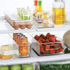 mDesign Plastic Kitchen Pantry Cabinet, Refrigerator, Freezer Food Storage Organizer Bin - for Fruit, Drinks, Snacks, Eggs, Pasta - Combo Includes Bins, Condiment Caddy, Egg Holder - Set of 4 - Clear